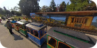 Thumbnail view of the seasonal mini-train ride in front of its mini-train station